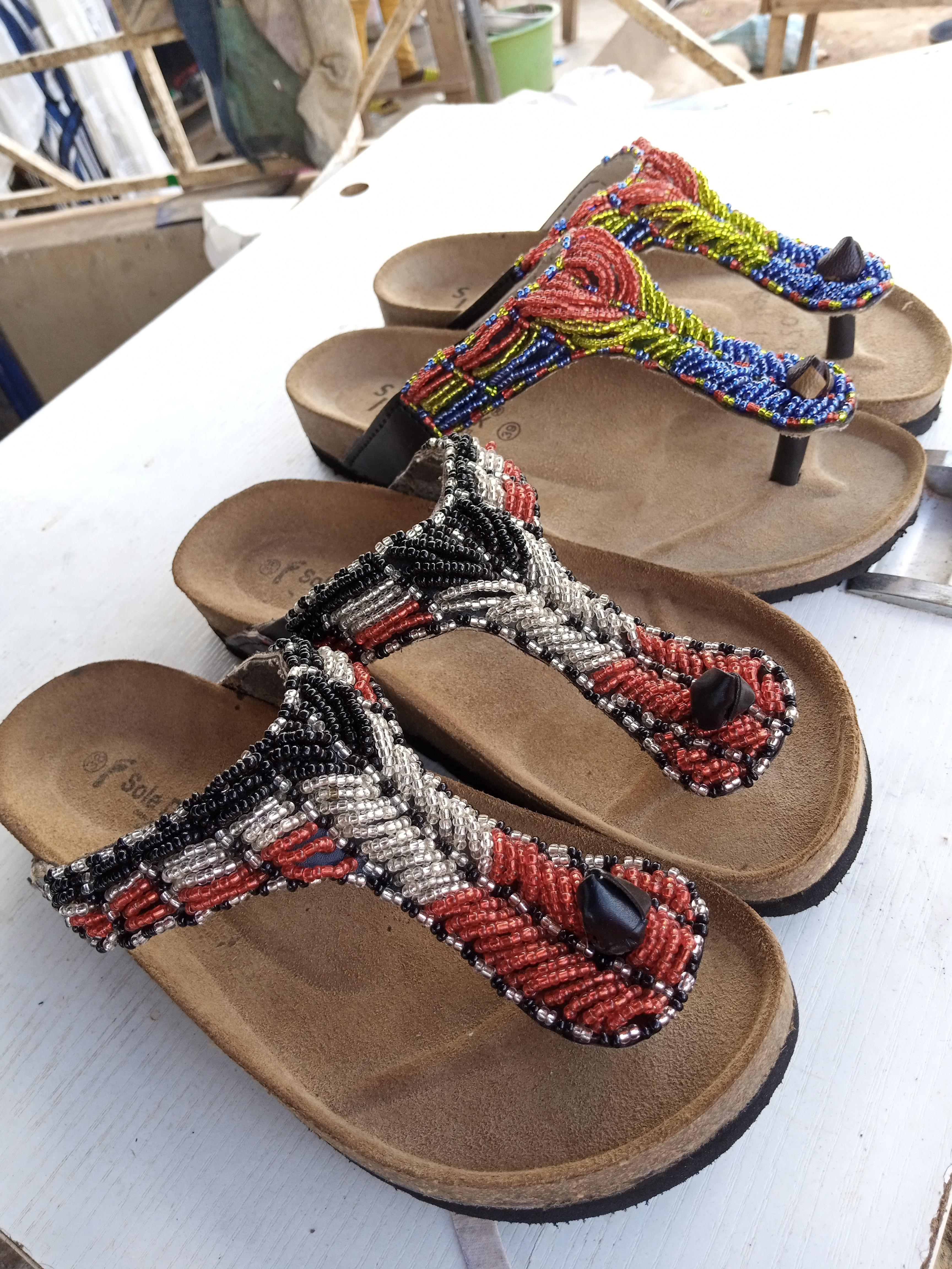 Ladies berk with beads in Ghana